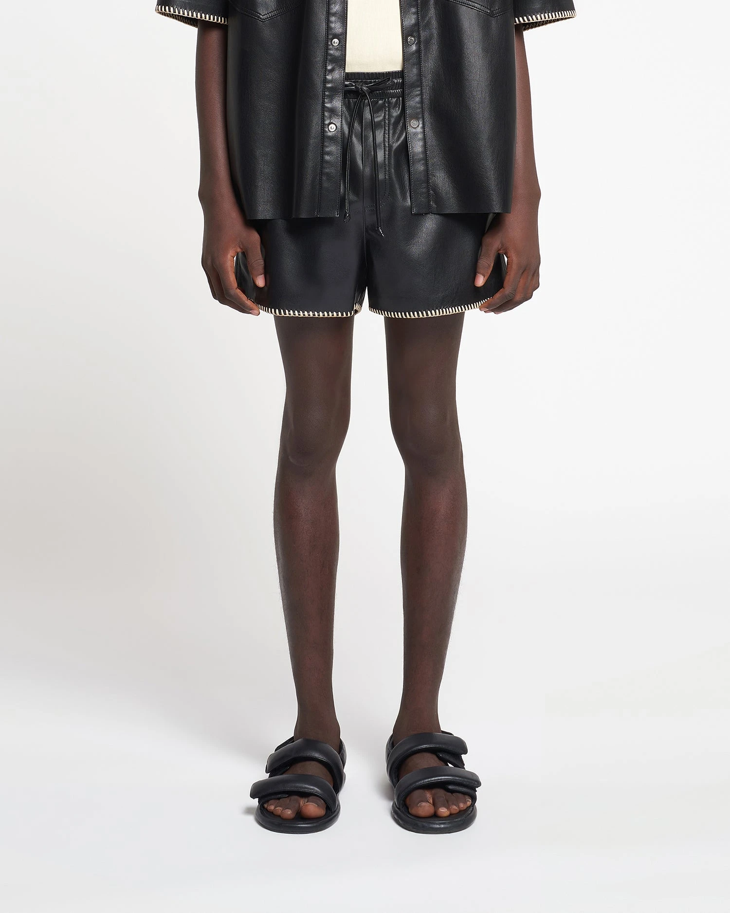 Nanushka Amil - Raffia-Trimmed Okobor™ Alt-Leather Shorts - Black 3 Nanushka Amil - Raffia-Trimmed Okobor™ Alt-Leather Shorts - Black