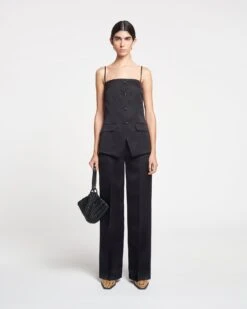 Nanushka Lanai - Tailored Tech-Satin Pants - Black 8 Nanushka Lanai - Tailored Tech-Satin Pants - Black -Nanushka Wear Shop NAN SS24 ECOMM WW FULL BODY CROPPED 11 320e2320 c7b0 4f1d a9b6 d2a343ac62e3