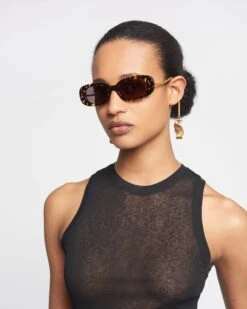 Nanushka Aliza Charm - Bio-Plastic Oval Sunglasses - Leopard -Nanushka Wear Shop NAN SS24 ECOMM WW FULL BODY CROPPED 211