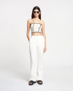 Nanushka Manola - Okobor™ Alt-Leather Pants - White -Nanushka Wear Shop NAN SS24 ECOMM WW FULL BODY CROPPED 34 a3d12f63 5816 42cd a226 ec366e87658d