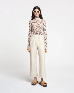 Nanushka Harri - Mesh-Jersey Turtleneck Top - Scribble Logo -Nanushka Wear Shop NAN SS24 WW FULL BODY CROPPED 160