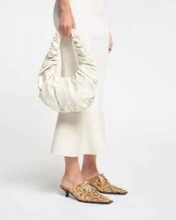 Nanushka Anja Bag - Ruched Patent Alt-Leather Shoulder Bag - Creme -Nanushka Wear Shop NAN SS24 WW FULL BODY CROPPED 69
