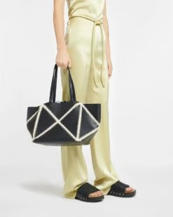 Nanushka The Origami Tote Large - Alt-Nappa Crochet Large Tote - Black Creme 17 Nanushka The Origami Tote Large - Alt-Nappa Crochet Large Tote - Black Creme -Nanushka Wear Shop NW23CRBG02499 THEORIGAMITOTE BLACK CREME ALT NAPPAPW ac183c49 9e78 4711 869e 5fd05fc7c882