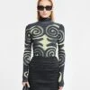 Nanushka Josa - Mesh-Jersey Turtleneck Top - Spiral Spray 1 Nanushka Josa - Mesh-Jersey Turtleneck Top - Spiral Spray -Nanushka Wear Shop NW24RSTP01999 JOSA SPIRALSPRAY RECYCLEDMESHJERSEY 03copy