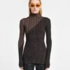 Nanushka Zareen - Ribbed Merino Wool Turtleneck Top - Fossil/Black 2 Nanushka Zareen - Ribbed Merino Wool Turtleneck Top - Fossil/Black -Nanushka Wear Shop NW24RSTP03698 ZAREEN FOSSIL BLACK VISCOSEMERINORIB 03