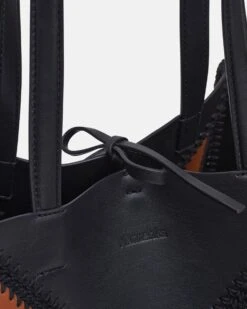 Nanushka The Origami Tote - Alt-Nappa Crochet Tote - Tan/Black Fw22 13 Nanushka The Origami Tote - Alt-Nappa Crochet Tote - Tan/Black Fw22 -Nanushka Wear Shop THEORIGAMITOTE TAN BLACK VEGANNAPPAPATCHWORK 03