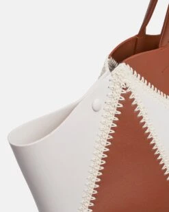 Nanushka The Origami Tote Large - Alt-Nappa Crochet Large Tote - Tan Leather 14 Nanushka The Origami Tote Large - Alt-Nappa Crochet Large Tote - Tan Leather -Nanushka Wear Shop THE ORIGAMI TOTE LARGE OFF WHITE TAN VEGAN NAPPA PATCHWORK 05 84aa9068 4a58 4efa 9310 75af4ee8cdb5