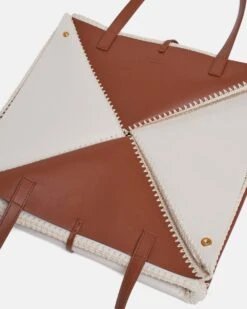 Nanushka The Origami Tote Large - Alt-Nappa Crochet Large Tote - Tan Leather 16 Nanushka The Origami Tote Large - Alt-Nappa Crochet Large Tote - Tan Leather -Nanushka Wear Shop THE ORIGAMI TOTE LARGE OFF WHITE TAN VEGAN NAPPA PATCHWORK 07 240e786e 753b 4f86 ad98 0eb70d8a8ac4